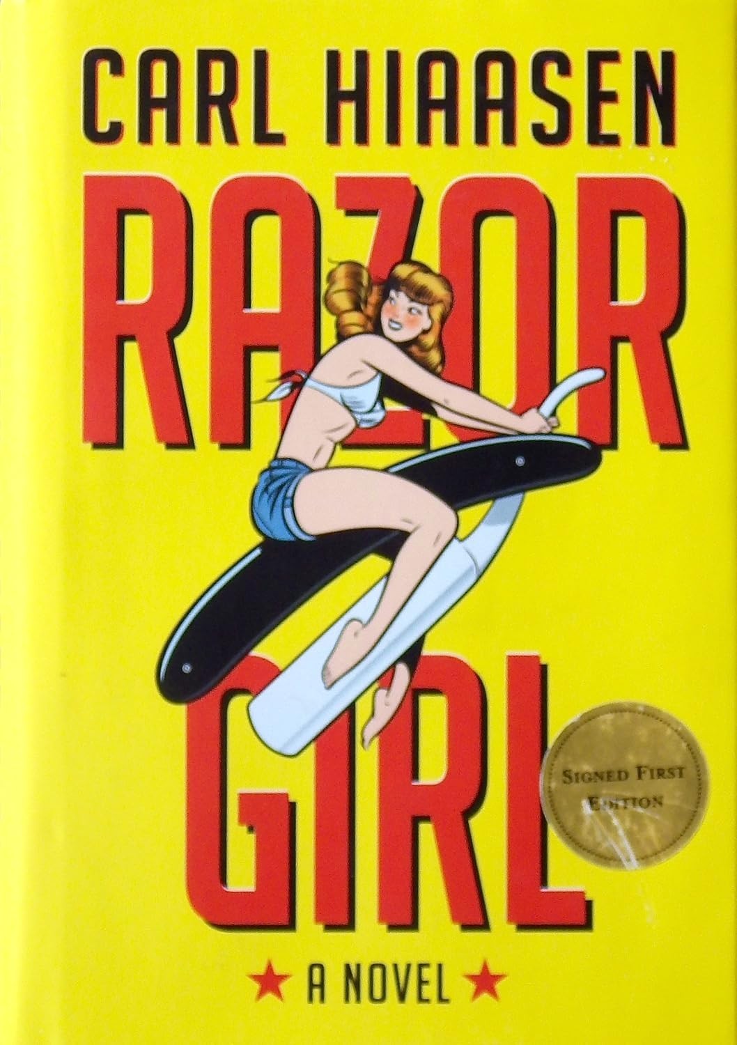Razor Girl: A novel Hardcover – Deckle Edge, by Carl Hiaasen
