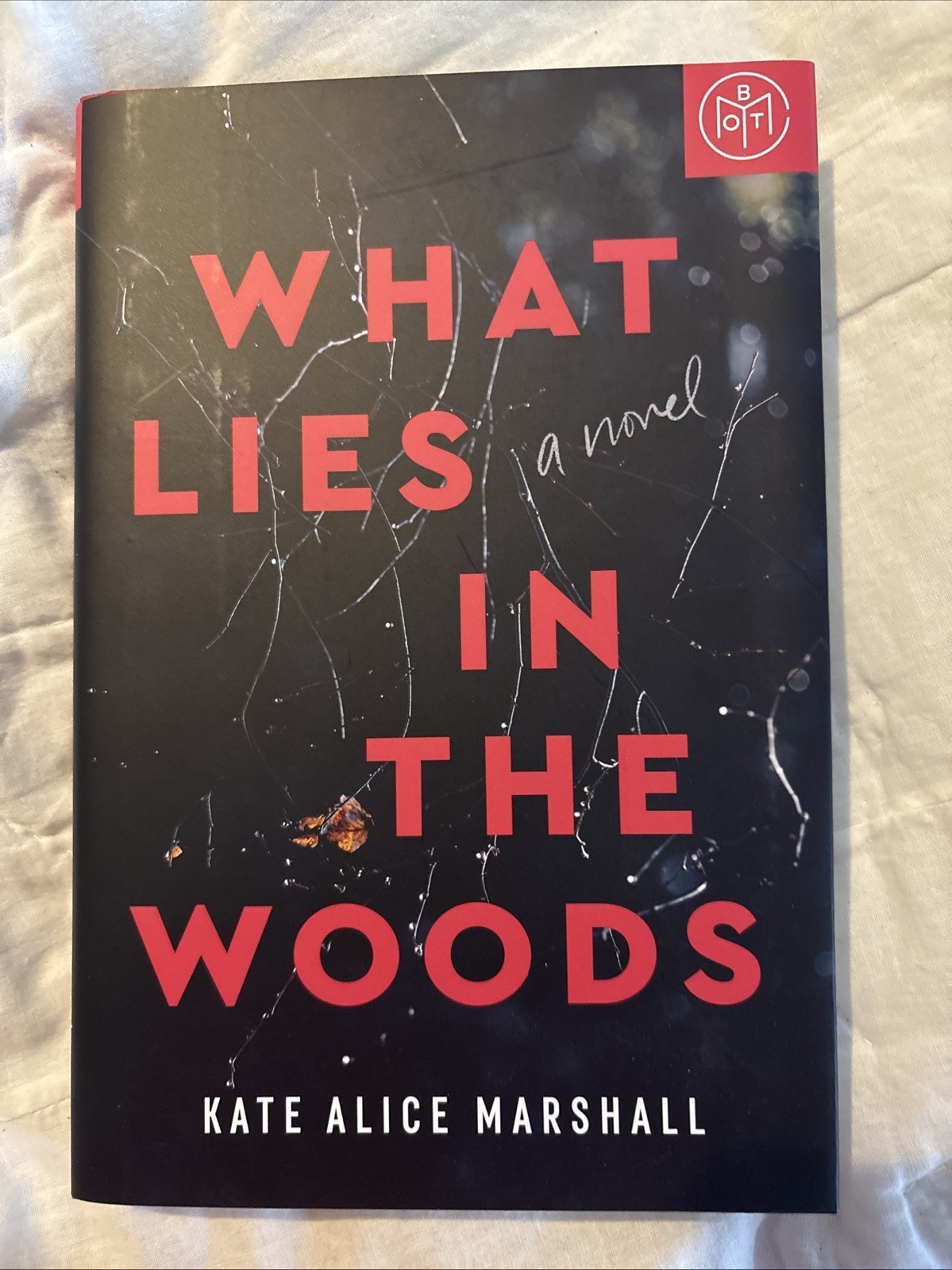 What Lies in the Woods: A Novel Paperback – 2024 by Kate Alice Marshall