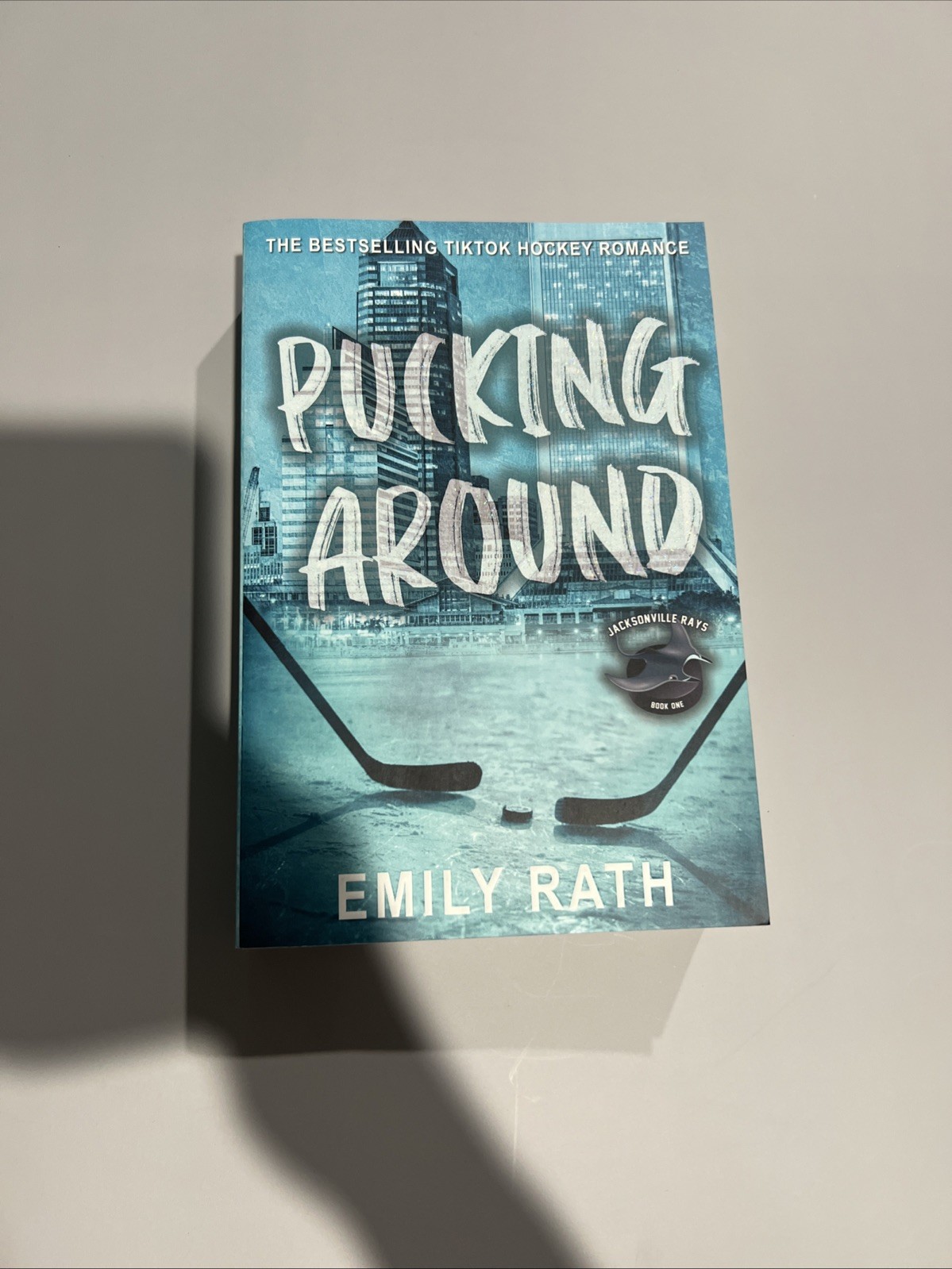 Pucking Around: A Why Choose Hockey Romance by Emily Rath