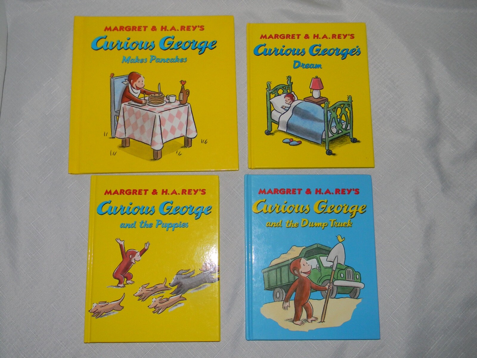 Curious George Hardcover Book Lot of 4 ~ Puppies ~ Pancakes ~ Dump Truck ~ Dream
