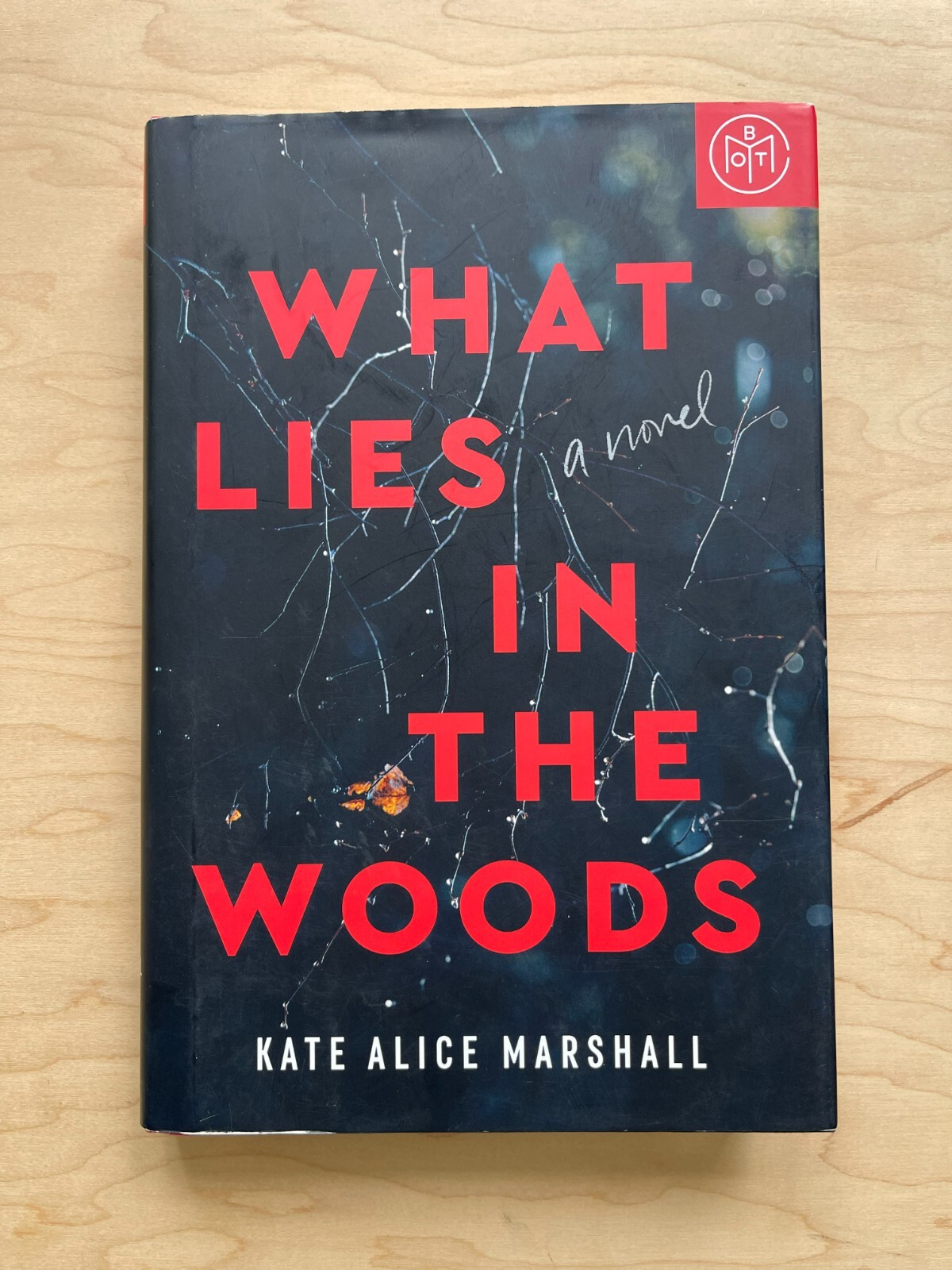 What Lies In The Woods- A Novel By: Kate Marshell- A B.O.T.M Edition Hardcover